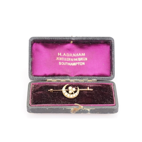 216 - A 15ct Gold Crescent Moon and Three Leaf Clover brooch set with pearls in Original Box. Weight appro... 