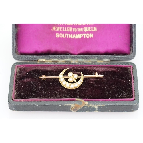 216 - A 15ct Gold Crescent Moon and Three Leaf Clover brooch set with pearls in Original Box. Weight appro... 