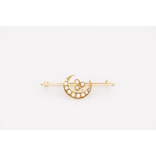 216 - A 15ct Gold Crescent Moon and Three Leaf Clover brooch set with pearls in Original Box. Weight appro... 