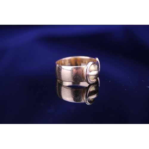 220 - An 18ct Gold Buckle Ring set with two small Diamonds. Total weight approximately: 5.9grams. Size app... 