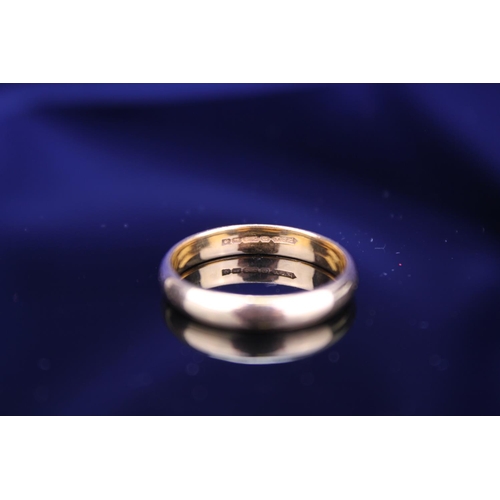 224 - A large Gentleman's 22ct Gold wedding band, 