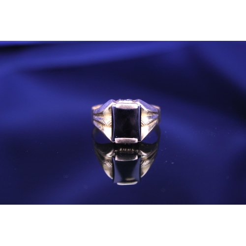 225 - A Gentleman's 750 marked Signet Ring mounted with a rectangular Onyx. Onyx size: approximately 1cm x... 