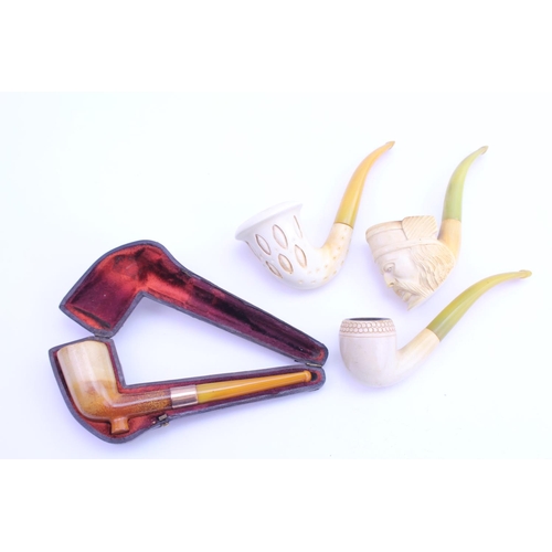 333 - A Victorian Meerschaum Pipe in Case with an Amber Mouth Piece, one other of a Tartare's head, Sherlo... 