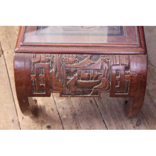 608 - A Chinese Hardwood Low Down Scroll Over Opium Table with carved decoration. Measuring: 99cms across ... 