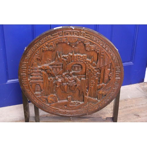 585 - A Chinese Carved Hardwood Fold Over Topped Coffee Table Fire Screen. Measuring: 59cms across x 53cms... 