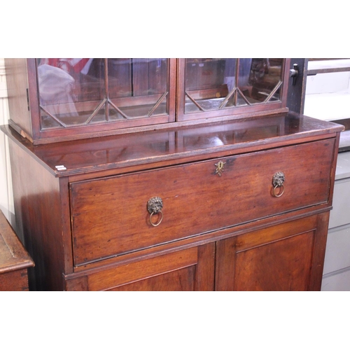 588 - A Georgian Mahogany Secretaire fitted Book Case with an Astragal glazed Double Doored Swan Neck Top ... 