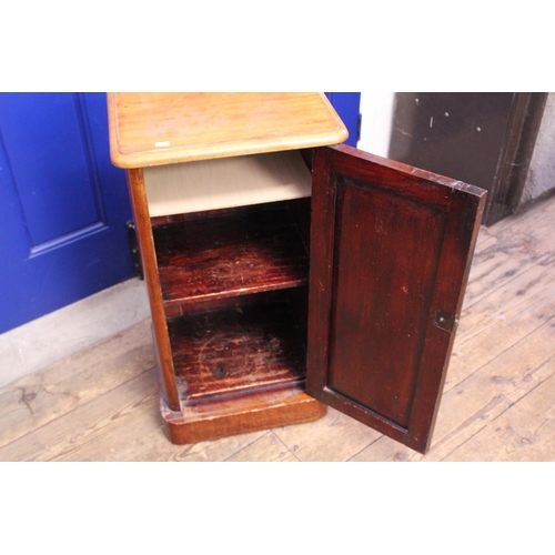 592 - A Victorian Mahogany Bedside Cupboard. Measuring: 39cms across x 34cms deep x 76cms high.