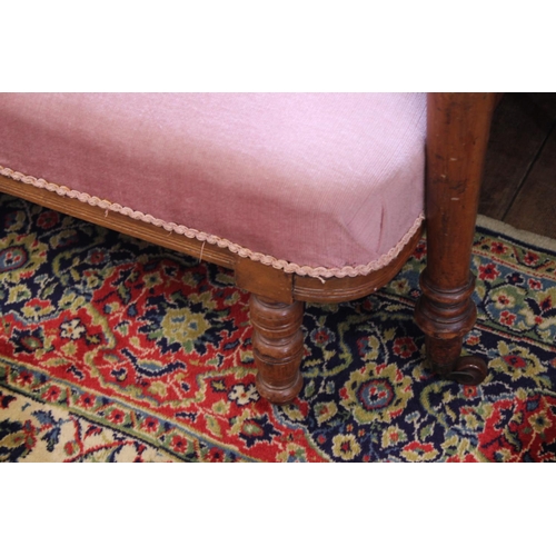 601 - A Victorian Left Handed Button Backed Chaise Lounge with carved front, Bobbin Turned Arm resting on ... 