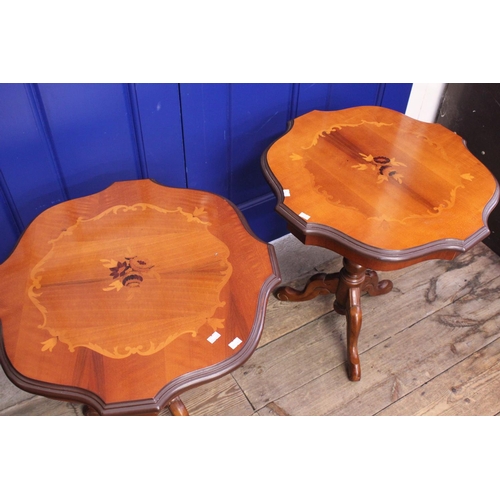 618 - A Pair of Reproduction Side Tables resting on tripod bases, inlaid with flowers. Measuring: Height 5... 