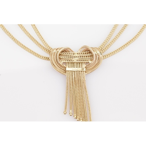 199 - A Ladies 9ct Gold Milanese Strap Knot Necklace. Total weight: approx 32 grams.