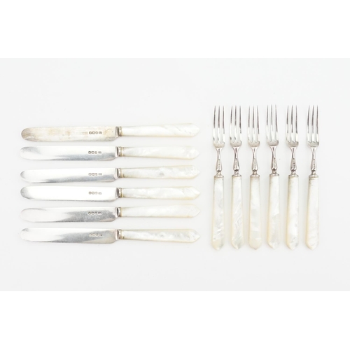 73 - A set of 6 of each mother of pearl handle knives and forks.