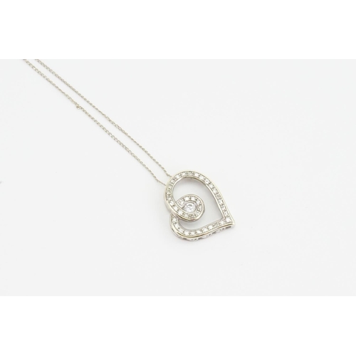 262C - A 9ct white gold love heart pendant on chain, set with diamonds. Total weight approx 2.3g.