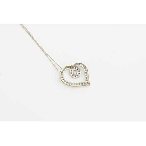 262C - A 9ct white gold love heart pendant on chain, set with diamonds. Total weight approx 2.3g.