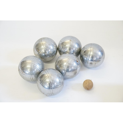 652 - A Set of Six 1950s French Chrome Boules along with a Small Wooden Ball.