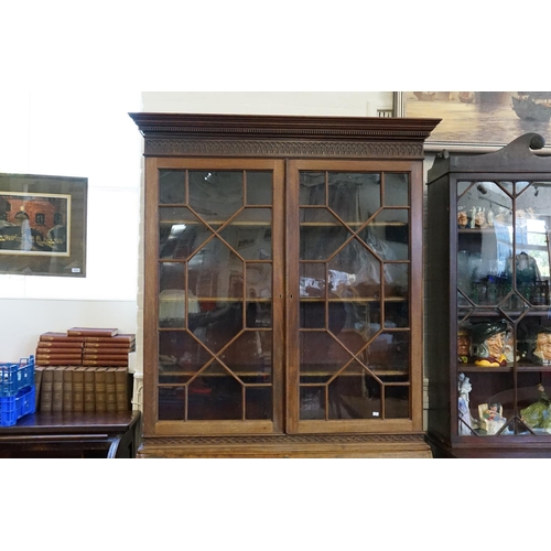 394 - A Georgian Mahogany Bureau fitted with Four Graduated Drawers, Brush & Slides, Swept Bow Feet, Brass... 