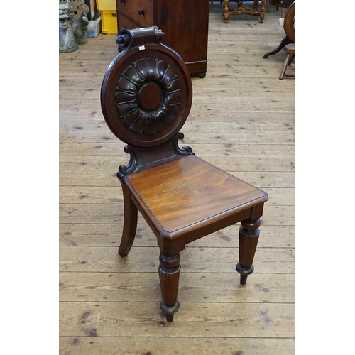 396 - A Victorian Mahogany Carved Back Hall Chair resting on Octagonal Cut & Turned Front Legs & Scroll Ba... 