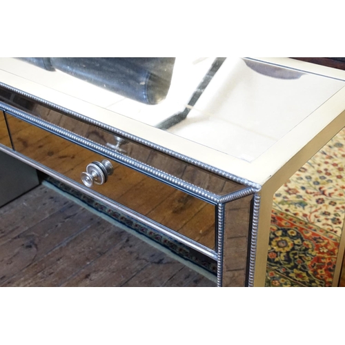 397 - A Two Door Mirrored Glass & Silver Finished Side Table. Measuring: 143cms across x 46cms deep x 82cm... 