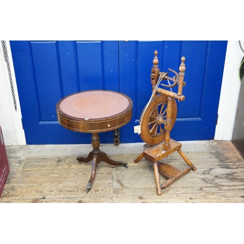 404 - A Late 19th Century Spinning Wheel along with a circular Mahogany Coffee Table with fitted Drawers.