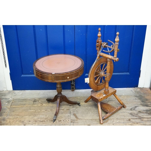 404 - A Late 19th Century Spinning Wheel along with a circular Mahogany Coffee Table with fitted Drawers.