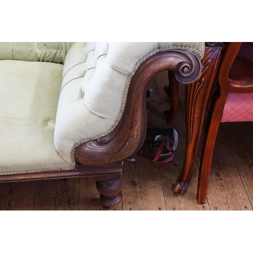 534 - A Victorian Mahogany framed & pierced backed & Button Backed Left Arm Chaise Lounge resting on turne... 