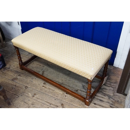 538 - A Georgian design Mahogany turned column footstool with cross stretchers & Upholstered in a Beige Tw... 