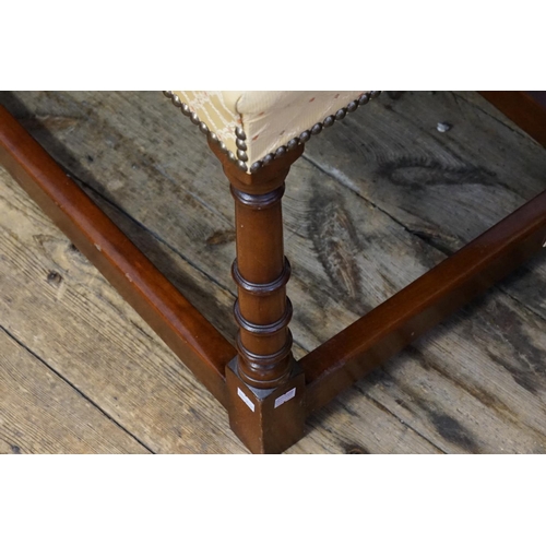 538 - A Georgian design Mahogany turned column footstool with cross stretchers & Upholstered in a Beige Tw... 