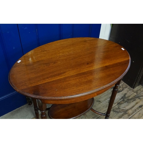 540 - A Victorian Mahogany Oval Topped Tea Table with Jardiniere Under Tier & Fluted Legs. Measuring: 76cm... 