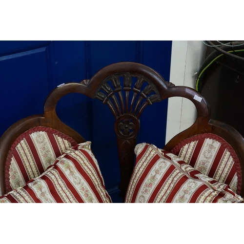 558 - An Edwardian Drawing Room Chair with pierced Back, Butterfly Winged Sides & resting on shaped feet u... 