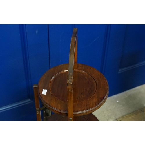 563 - A 1920s Three Tiered Folding Cake Stand.