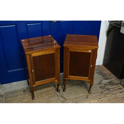 574 - A Pair of Mahogany Bedside Cupboards resting on slender pad feet. Measuring: 42cms across x 73cms hi... 