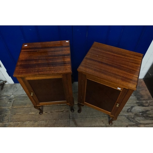 574 - A Pair of Mahogany Bedside Cupboards resting on slender pad feet. Measuring: 42cms across x 73cms hi... 