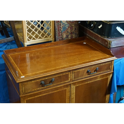 575 - A Mahogany & Satinwood inlaid Two Drawers Serving Cupboard with Tray Back & fitted with two drawers.... 