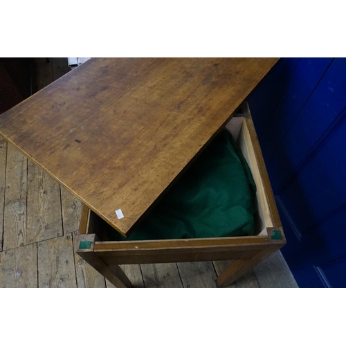 576 - A Georgian design Fold Over Top Card Table with Green inlay resting on square legs fitted with a Dra... 