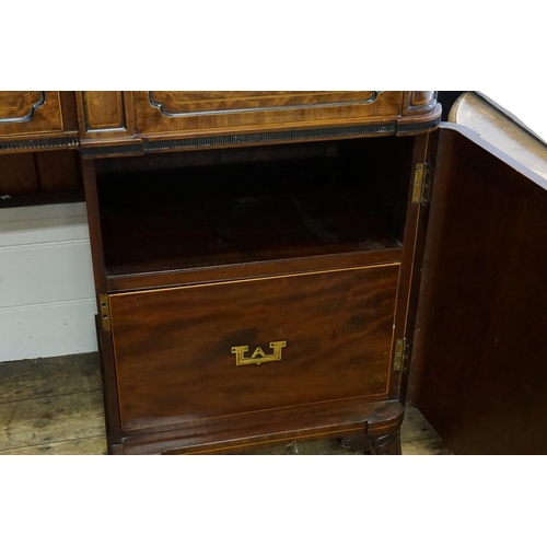 588 - A Large Scottish Sunk Section Sideboard with Cuban Mahogany Veneered Doors & resting on carved feet.... 