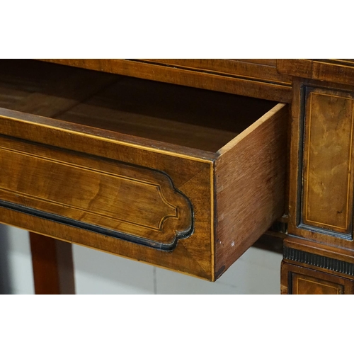 588 - A Large Scottish Sunk Section Sideboard with Cuban Mahogany Veneered Doors & resting on carved feet.... 