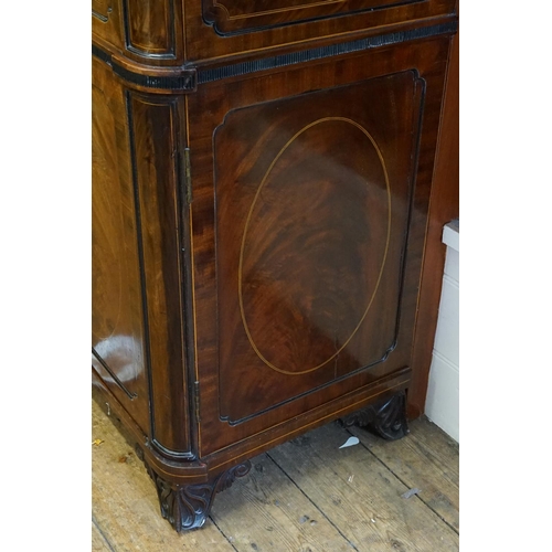 588 - A Large Scottish Sunk Section Sideboard with Cuban Mahogany Veneered Doors & resting on carved feet.... 