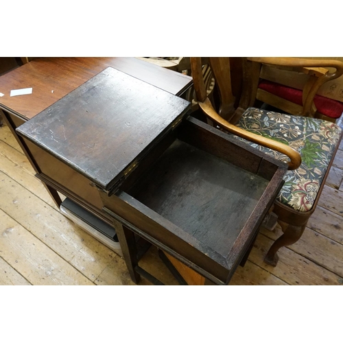 593 - A Child's School Desk with Lift-Up Top resting on square legs. Measuring: 39cms across x 73cms high ... 