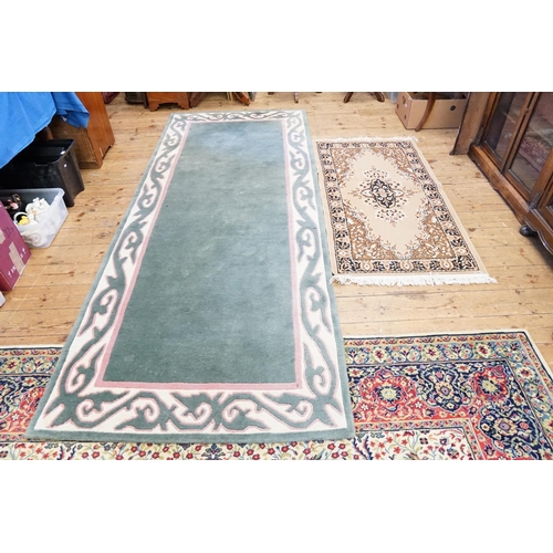 265 - An All Over Green Ground Pink Shaped Bordered Floral Edged Hall Runner along with one other in Beige... 