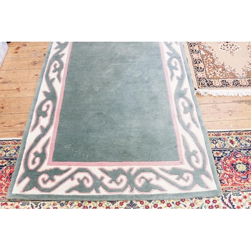 265 - An All Over Green Ground Pink Shaped Bordered Floral Edged Hall Runner along with one other in Beige... 