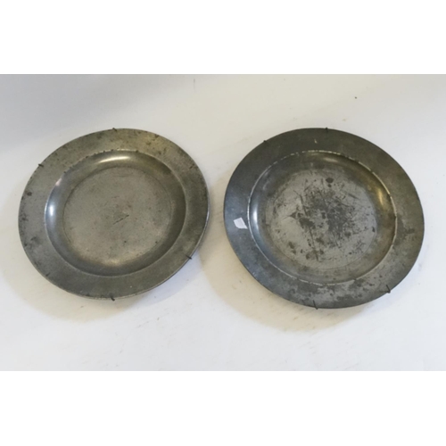 404 - A Pair of 18th Century Pewter Plates with Heraldic Crest of a Griffin over rope of dignitary.