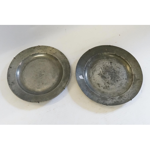 404 - A Pair of 18th Century Pewter Plates with Heraldic Crest of a Griffin over rope of dignitary.