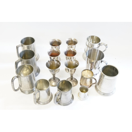 405 - A quantity of Pewter Mugs, Tankards, etc.