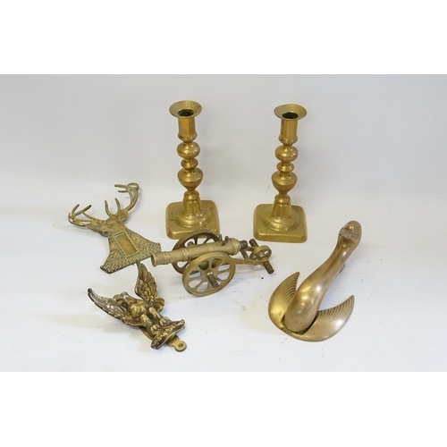 411 - A Swan door knocker, Canon & Candlesticks.