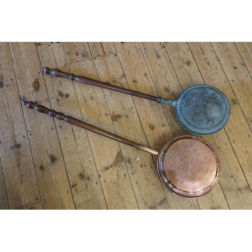 413 - Two Victorian Wooden & Copper Bed Warmers with Dutch engraved decoration.