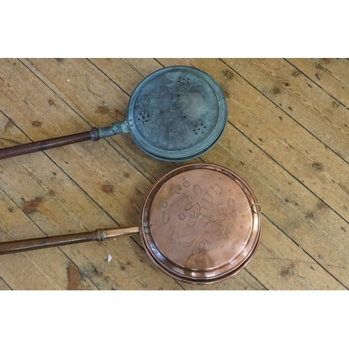 413 - Two Victorian Wooden & Copper Bed Warmers with Dutch engraved decoration.