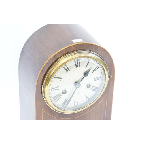 623 - A Satin Wood inlaid Mahogany Cased Drawing Room Clock with a nickel face.