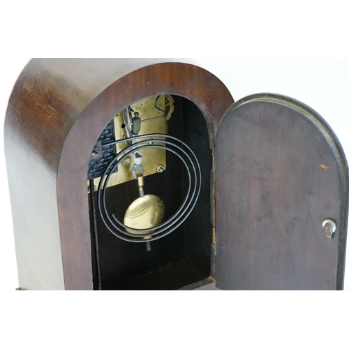 623 - A Satin Wood inlaid Mahogany Cased Drawing Room Clock with a nickel face.