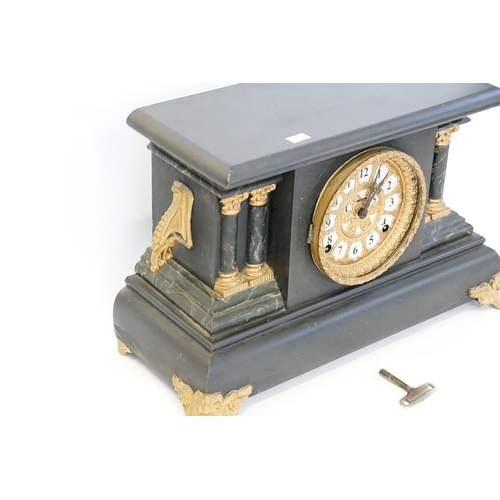 624 - A Late 19th Century Wood Cased French Made Mantle Clock with Gilt Metal Mounts.