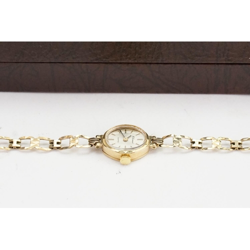 194 - A 9ct Gold Ladies Cocktail Wristwatch with a 9ct Gold strap. Total weight approximately: 8.6 grams.