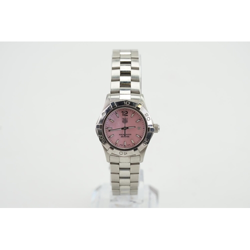 224 - A ladies stainless steel Tag Huer, pink mother of pearl dial in original box, along with papers and ... 